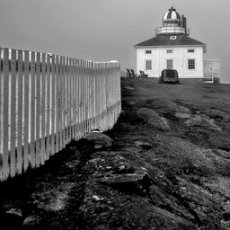© M Littlewood Lighthouse on Cliff NFLD 2